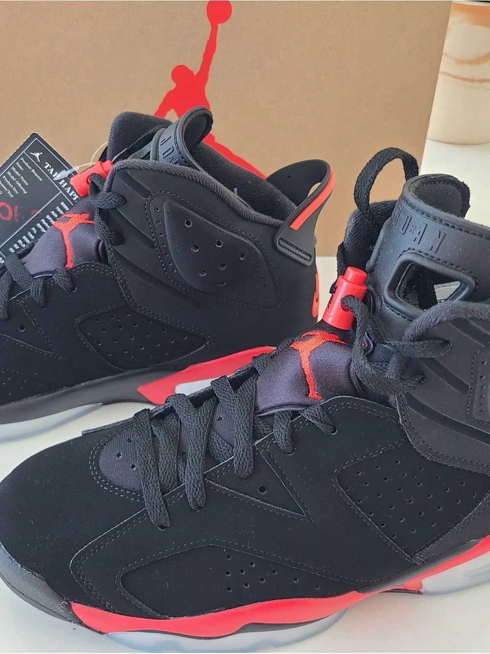 Jordan Kids Black Sneakers with Red Pull Tabs and Multicolor Tongue